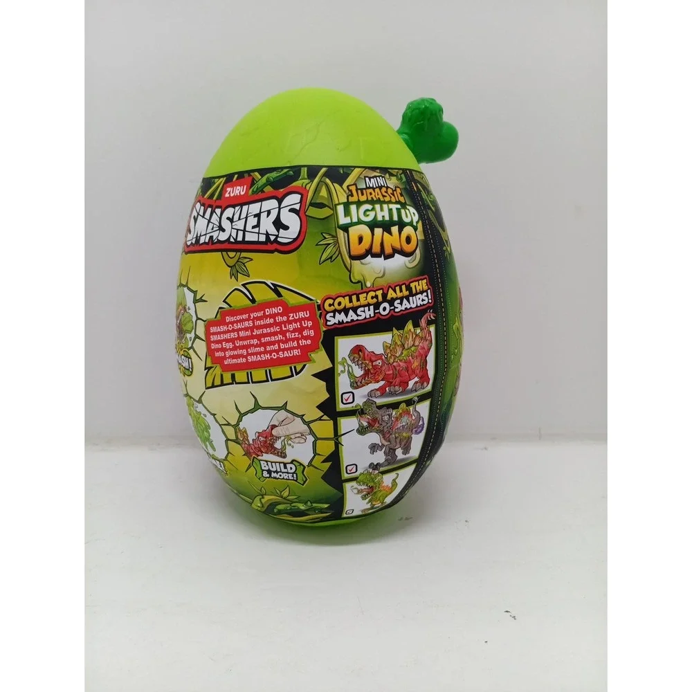 Zuru Smashers Mini Jurassic Light Up Dino Green Bone 6 Surprises Slime Egg ~NWT